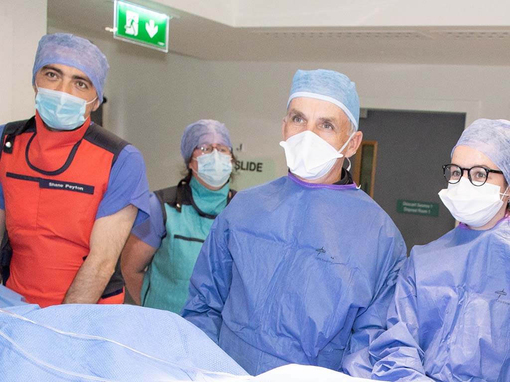 Doctors in operating theatre